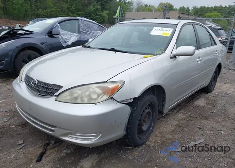 2004 Toyota Camry Le z USA, uszkodzony, nr VIN JTDBE32KX40270367